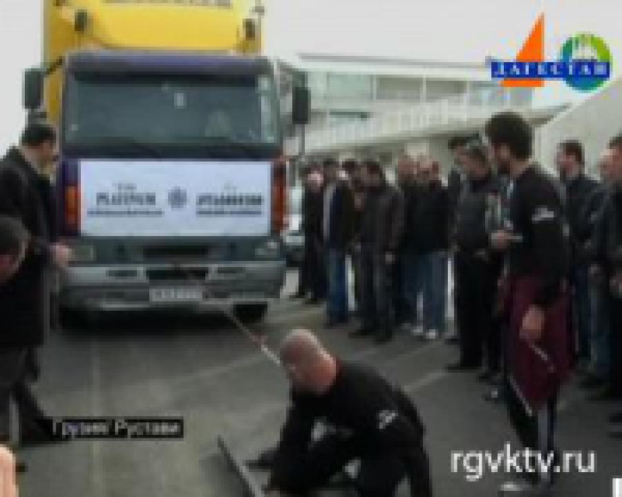 Грузинский спортсмен ухом сдвинул автофургон